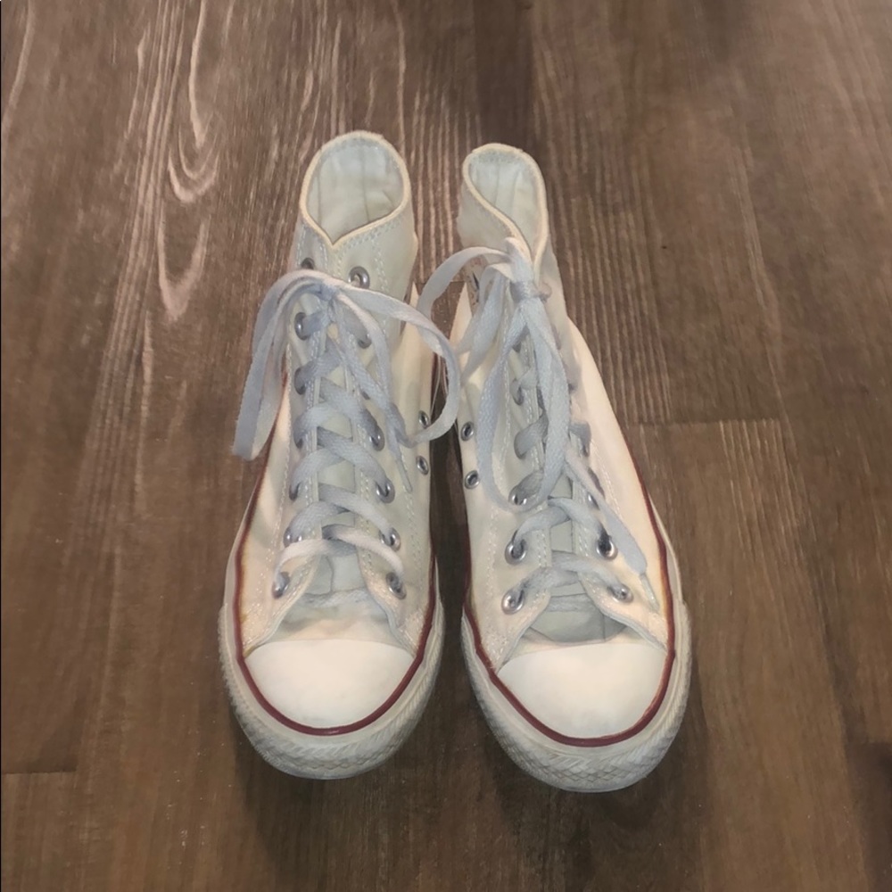 Cream converse high tops